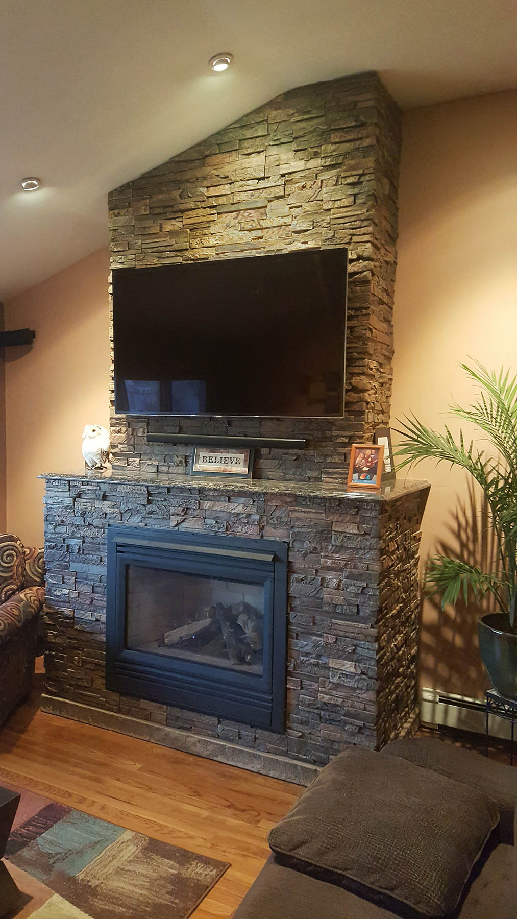 Panels installed around fireplace