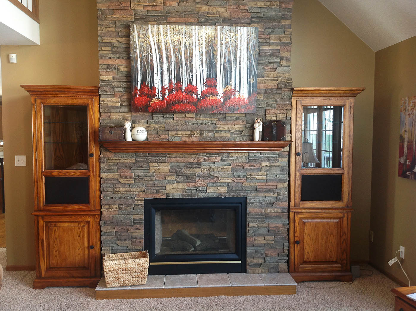 Panels installed around fireplace