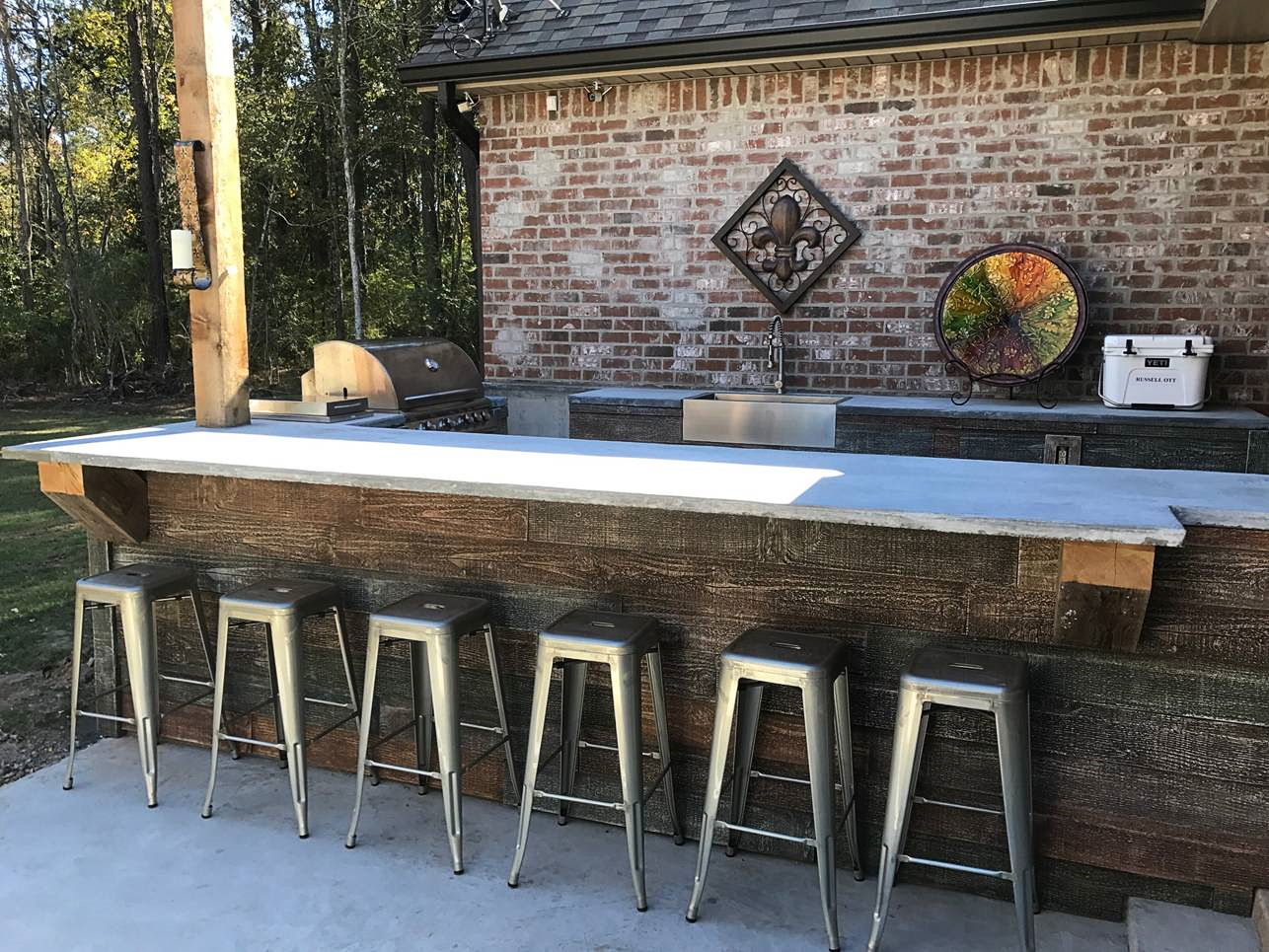 Barn board panels are a lovely accent for bar counters.