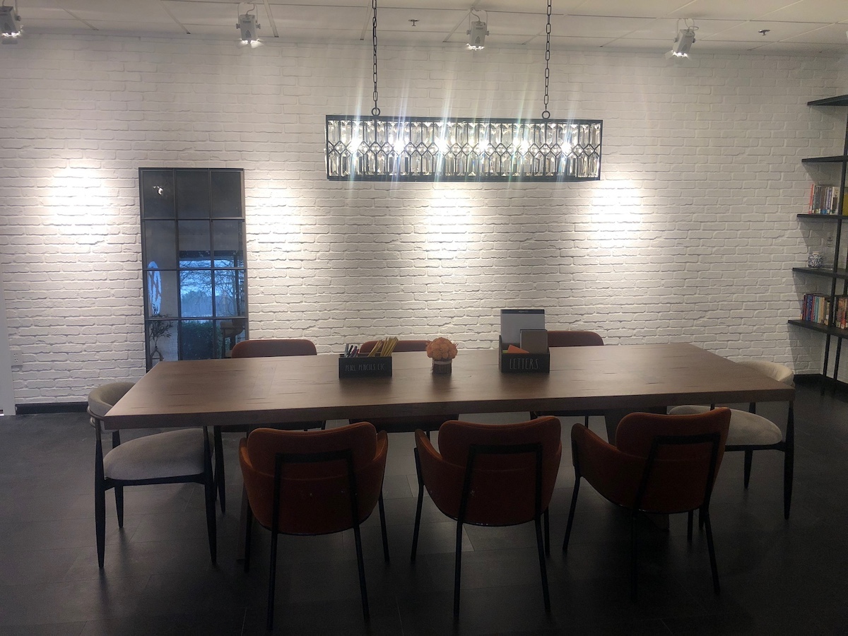 Glacier White Old Chicago Faux Brick Wall Panel decorating the interior wall of commercial space