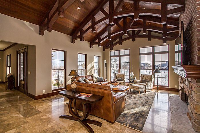 Painted Rough Hewn Faux Wood Arched Beams in a great room