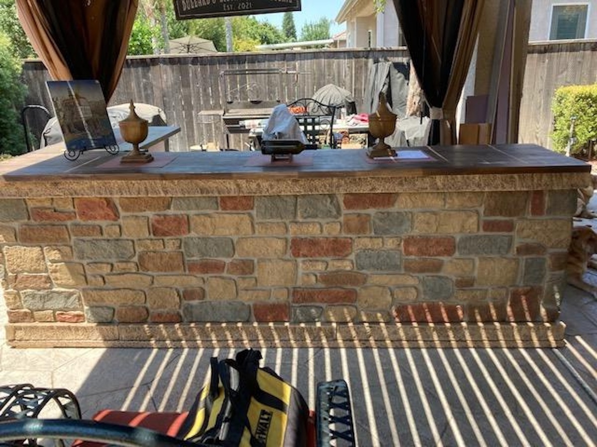 Hampton Cobblestone Faux Wall Panels in Harvest