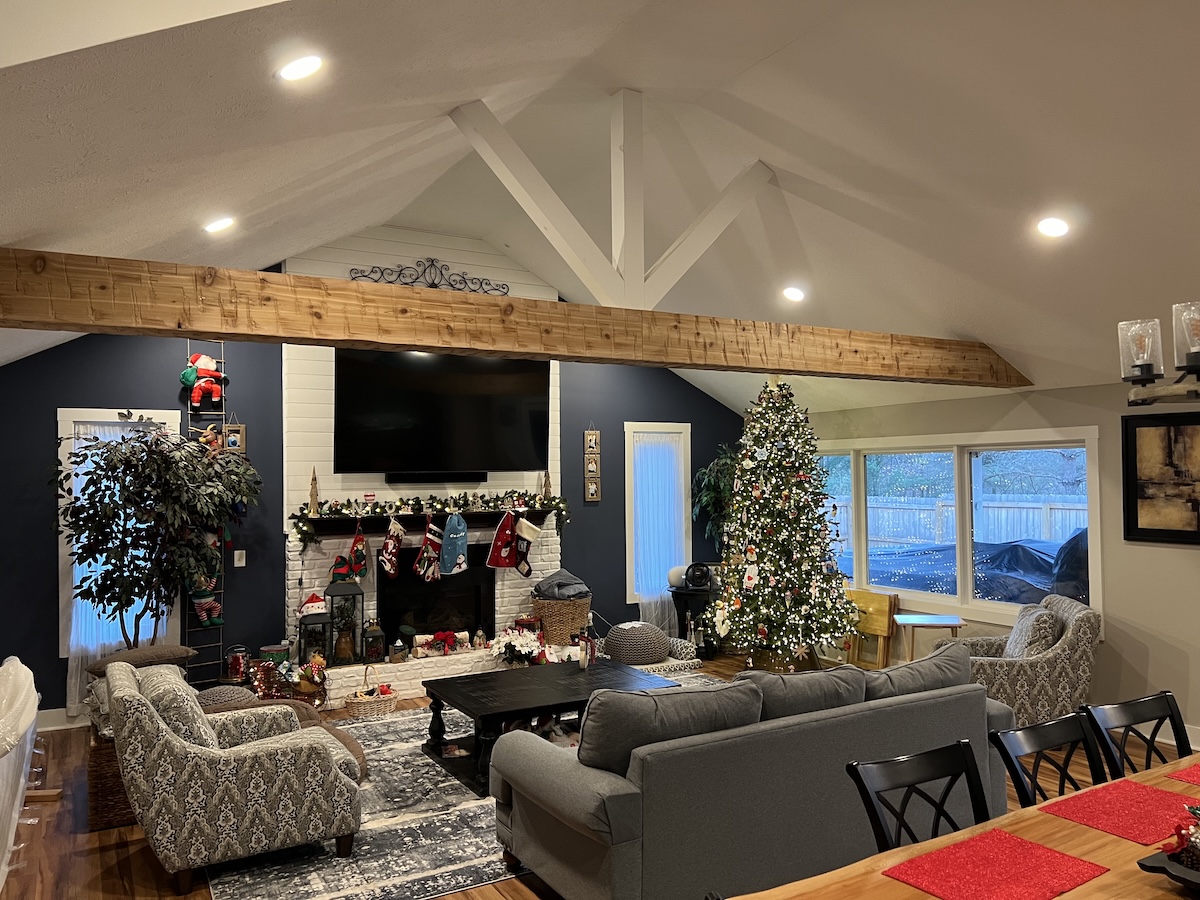 Heavy hand-hewn wood beam in warm natural