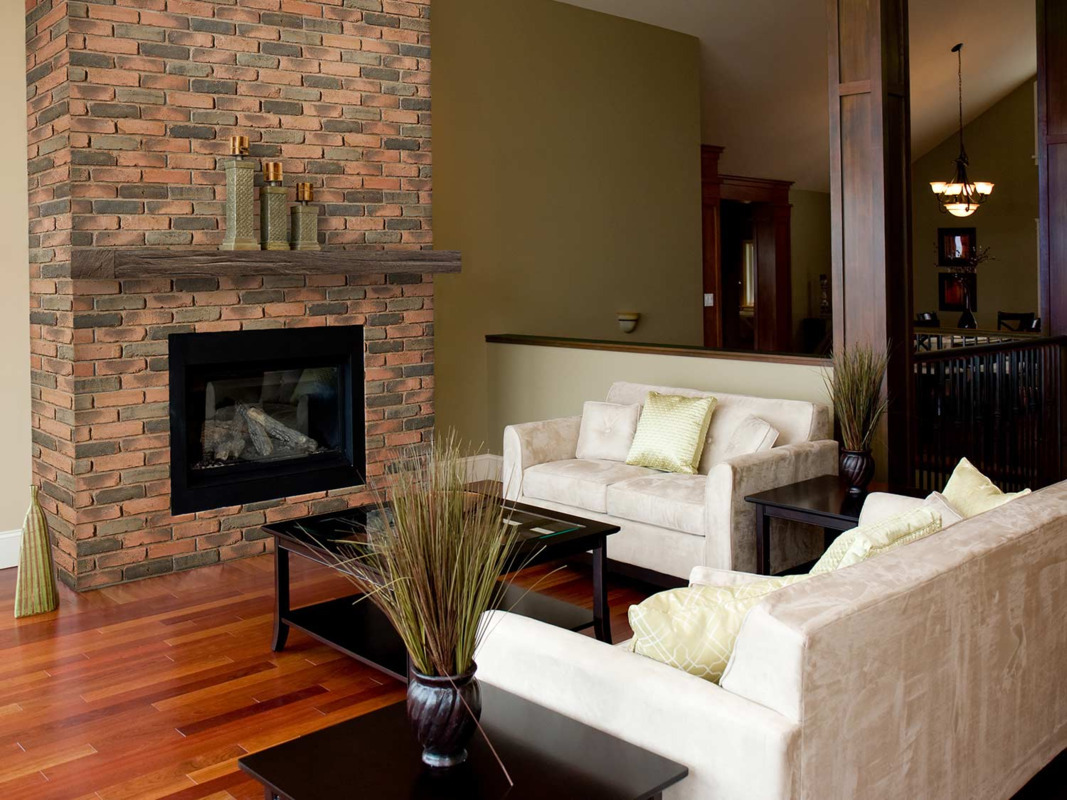 Old Chicago Faux Brick Wall Panels in Merlot installed on a fireplace