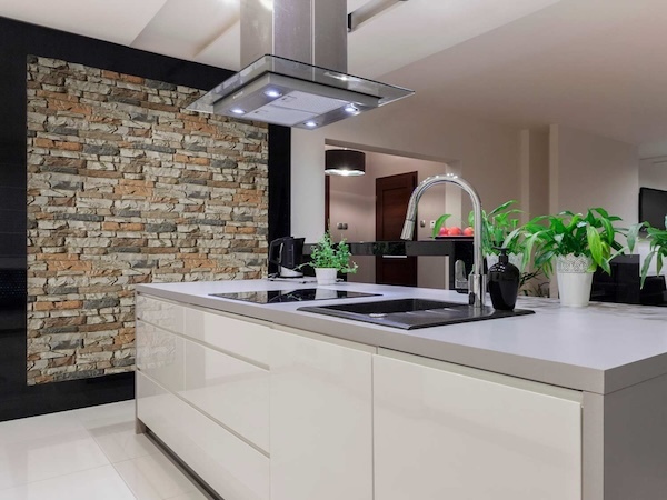 Kitchen design with Montana Dry Stack Faux Stone Wall Panels in Motley Gray