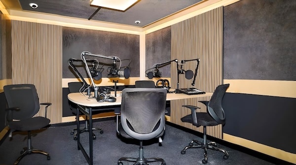 Slat Wood Acoustic Wall Panels in Oak installed in a podcast studio