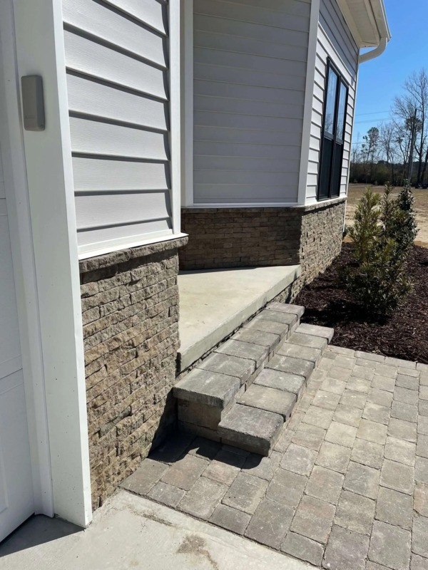 Evolve Stone District View stone veneer house siding and skirting in Morning Aspen color