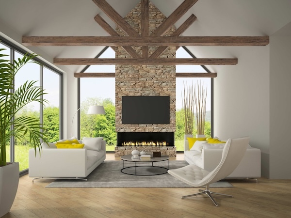 Nevada Dry Stack Faux Stone Wall Panels in Ponderosa installed on a stone fireplace accent wall