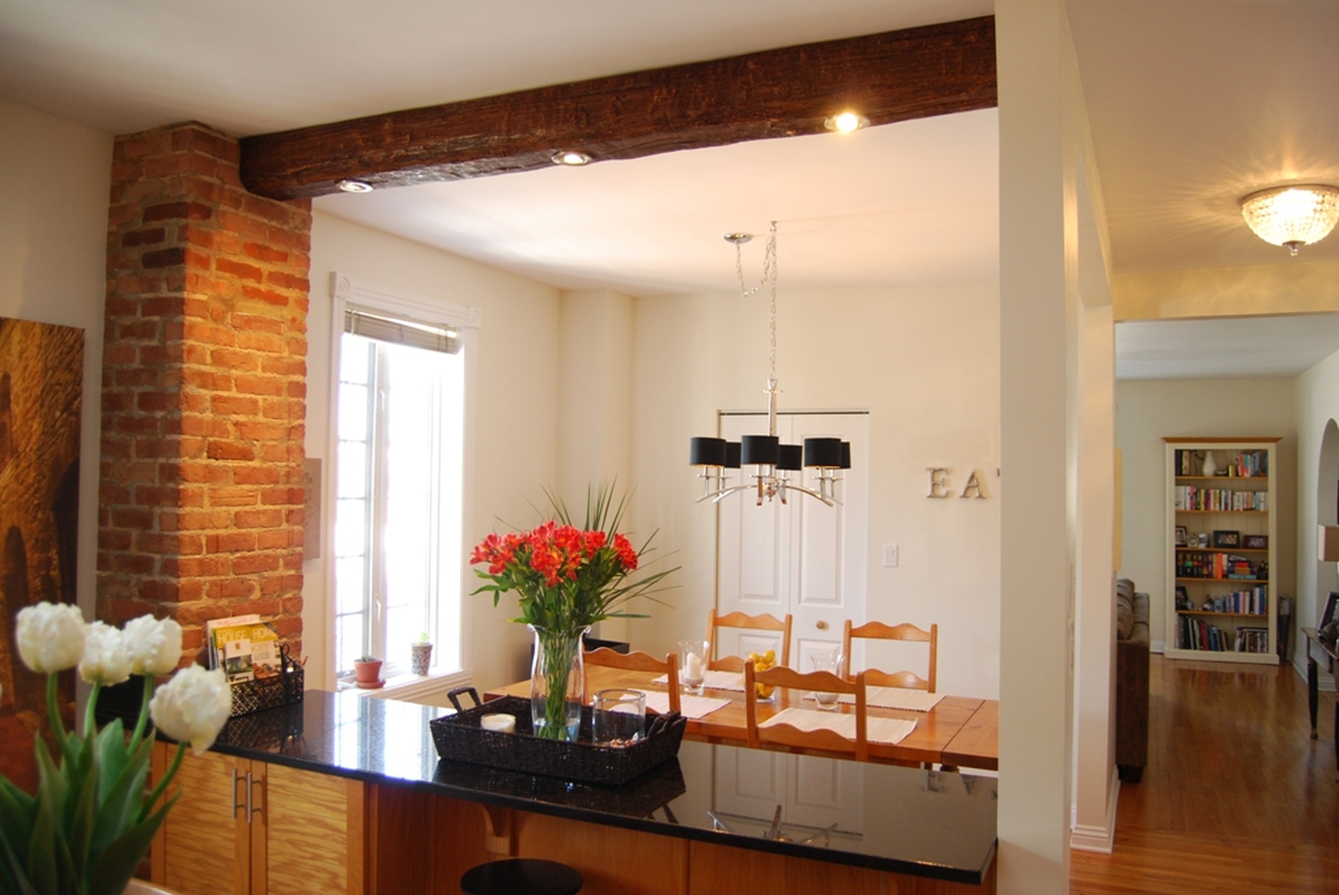 Recessed LED lighting in rustic faux wood beams