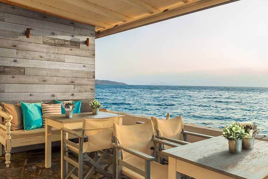 Reclaimed shiplap barnwood exterior wall siding panels in an outdoor entertaining area
