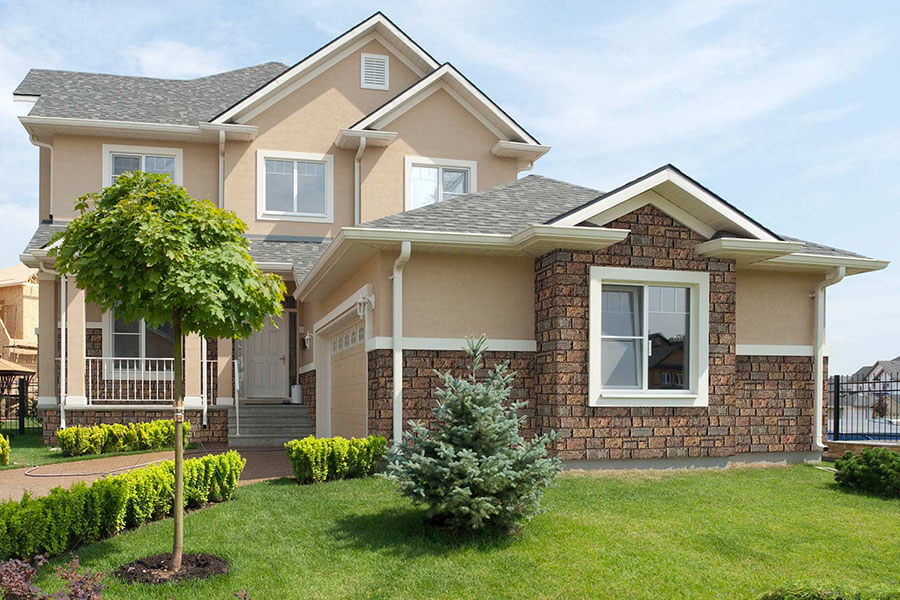 Regal chiseled stone used in a classic exterior home design