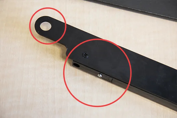 Soft Stop side that has the “+MORE and -LESS” and the small adjustment screw is close to the outside edge of the bracket, next to the circular hole Soft Stop side that has the “+MORE and -LESS” and the small adjustment screw is close to the outside edge of the bracket, next to the circular hole