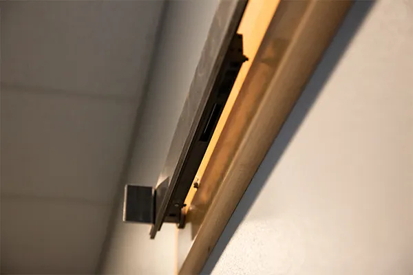 Attaching the flat track to the wall or ledger board, alternate view