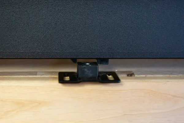Position the trigger between the tabs of the actuator. Position the trigger between the tabs of the actuator.