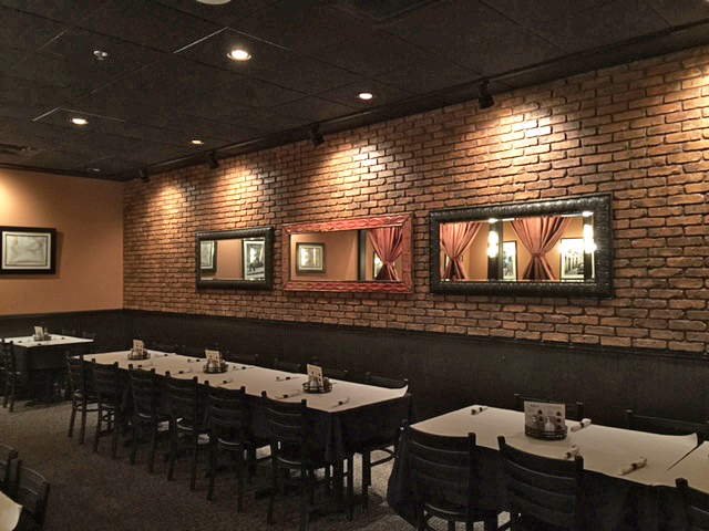 Restaurant interior design is given a stunning look with Old Chicago brick panels.